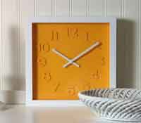 Embossed numbers clock